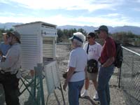 22-Mom_and_Dad_looking_at_the_weather_station_for_Death_Valley