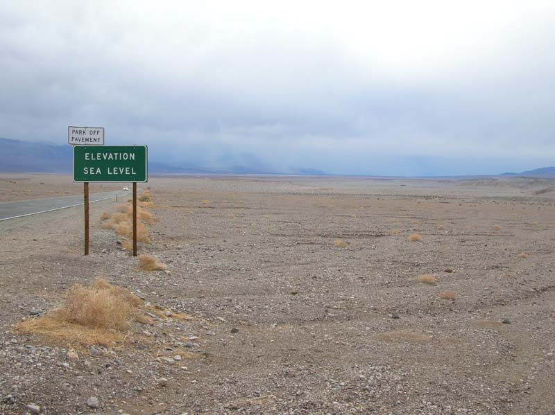14-sea_level_sign_and_valley_storms_in_background