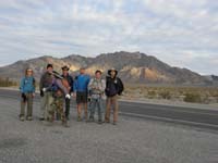 03-group_at_trailhead_on_Hwy_190_with_Pyramid_Peak-Anji_Jerry_Richard_Bart_Eric_me-Kay_getting_into_position