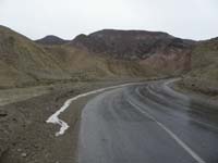 17-driving_downhill_we_encountered_several_small_streams_flowing_along_road-stopped_to_enjoy_one