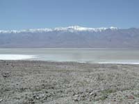28-salt_flats-rare_lake_near_Badwater_with_snowy_peaks_in_background