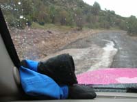 104-road_to_be_paved_later_this_year-every_flash_flood_will_destroy_road_again-high_replacement_costs