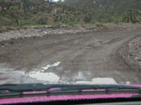 117-fresh_gravel_on_road_is_mushy_from_rains