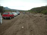 128-massive_amount_of_water_flowed_through_here_earlier-over_mile_of_road_destroyed