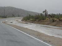 21-most_water_I've_seen_flowing_along_road
