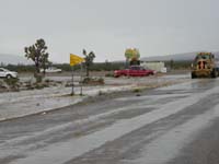 14-vehicles_crossing_the_flood_waters-some_are_visitors_on_the_way_to_the_Grand_Canyon