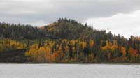 20-Fall_colors_with_black_lava_along_Navajo_Lake