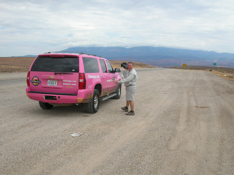05-John_getting_back_into_pink_after_taking_pictures-White_Pine_Mt_in_background