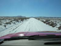 10-snowy_road_with_snow_covered_peaks