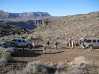 02-group_getting_ready_for_hike-two_park_rangers_already_on_route