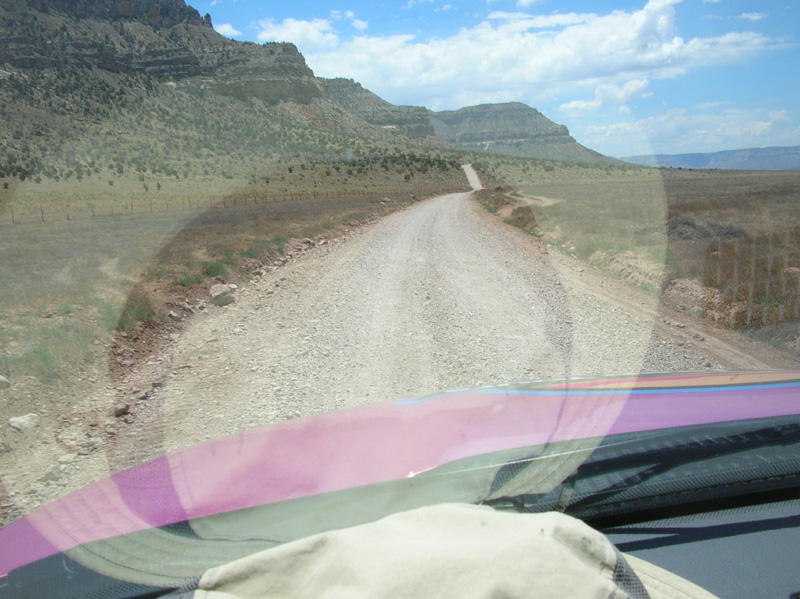 06-long_stretch_of_fresh_gravel-travel_15_mph_is_safe-note_the_other_path_others_have_taken_to_avoid_gravel
