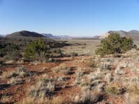 01-scenic_view_along_dirt_road_looking_west_towards_Vulcans_Throne_and_area_trail_starts