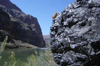 29-old_volcanic_rock_looking_downstream_towards_Lava_Falls-from_Luba