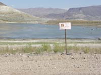 69-sign_will_need_to_be_moved_again-in_next_year_or_so_all_this_water_will_disappear
