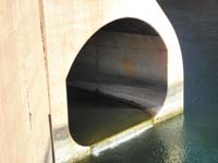 10-natural_spring_broke_through_concrete-flows_yearround_through_NV_Spillway_tunnel