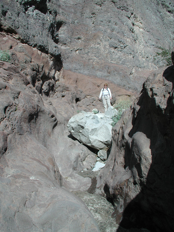 05-Kristi_about_to_climb_down_a_boulder
