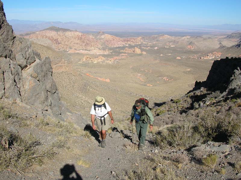 12-Joel_and_Greg_with_scenic_views_from_saddle