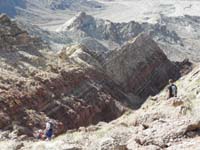 52-down_different_way-looks_like_Harlan's_leading_us_over_a_cliff-love_the_geologic_layers