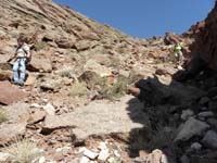 55-Colin_and_Ali_with_views_looking_up-about_45_degree_slope_dropping_about_400_feet