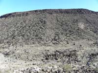 49-group_in_drainage-looking_at_ridgeline_we_followed_to_peak-lots_of_great_volcanic_rock