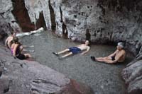 040-Peppe_and_I_along_with_a_couple_other_people_soaking_in_the_hot_spring-very_hot-from_Bill