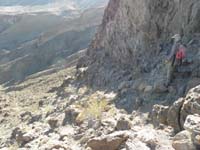 22-heading_down_to_that_drainage_in_center-steep_and_mostly_hard_volcanic_rock