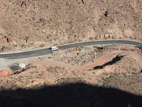 22-Black_Canyon_River_Adventure_van_with_Pink_Jeep_tourists_drive_by_old_dynamite_storage_bunker