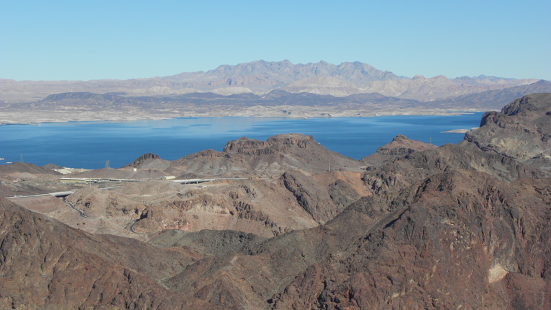 16-scenic_view_from_peak-looking_NNE-zoom_towards_Lake_Mead_and_Muddy_Mountains