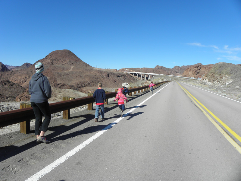 01-group_walking_along_old_road_to_Hoover_Dam_to_Sugarloaf_Mt-parked_at_Kingman_Wash_exit
