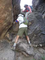 71-Laszlo_and_Kay_scrambling_down_rock