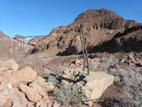 19-leftover_Hoover_Dam_construction_with_new_bridge_and_Sugarloaf_Mt_in_background