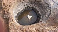 54-Kenny_found_a_heart_shaped_rock-put_it_in_a_puddle-wanted_a_picture_of_it