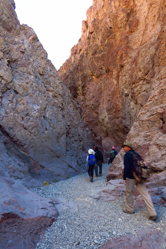 33-group_hiking_through_a_canyon
