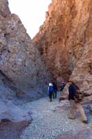 33-group_hiking_through_a_canyon