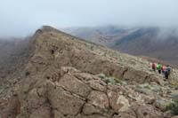 41-group_hiking_back_way_we_came_to_break_in_ridge_to_descend_making_trip_a_loop