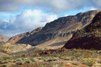 52-scenic_mountains_with_group_walking_on_road