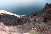 14-30_min_into_hike,we_climbed_a_bit-looking_back_to_Collin_and_lake-our_boat_in_view
