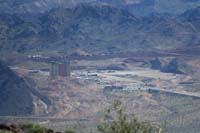 32-scenic_view_from_peak-looking_ESE-zoom_view_of_Hoover_Dam_Lodge_and_Casino_and_new_I11_construction
