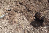 22-break_in_volcanic_crust-probably_an_old_lava_tube_of_some_sort