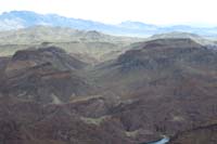 37-scenic_view_from_peak_looking_SE-towards_Fortress_Butte(L)_and_Sandwich_Peak(R),Peanut_in_foreground_distant_left