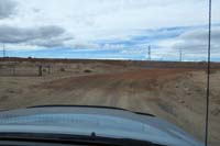 86-driving_back_on_dirt_road_approaching_new_I11_construction,we_used_to_go_that_way,now_right