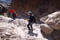 25-Richard_starting_rappel_3-50_feet,but_another_15_feet_needed_to_boulder_anchor