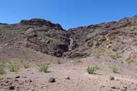 72-looking_back_to_Weeping_Springs_Canyon-we_will_eventually_head_up_to_right-noon,getting_quite_warm