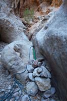 42-4th_rappel_rock_anchor_setup-looked_good,but_didn't_lift_every_rock_to_verify