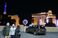 03-family_with_Paris_and_Planet_Hollywood_in_background-from_top_of_Bellagio_parking_garage