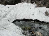 22-river_flowing_from_under_the_snow