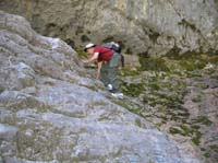 31-Dad_climbing_up_slippery_limestone