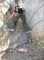 75-Dad_downclimbing_class_III_cliff