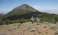 46-me_and_Bill_hiking_with_peak_in_background-from_Harlan
