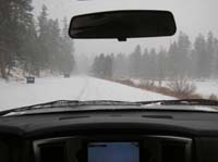 28-snow_covered_road_along_side_meadows_on_the_way_to_the_ski_resort